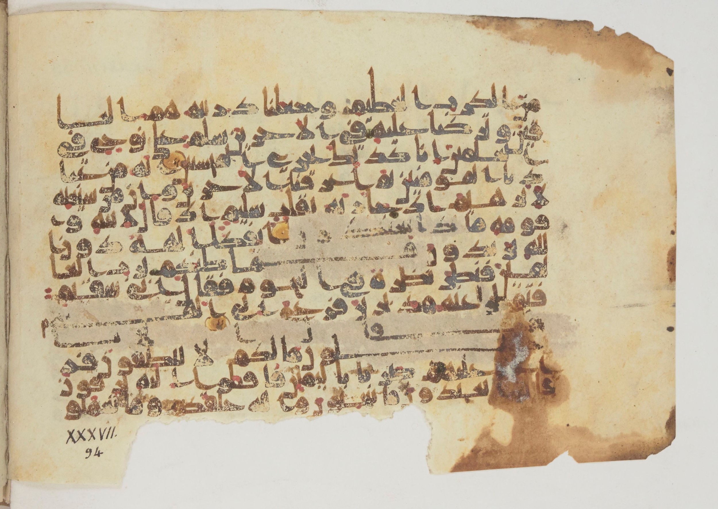 Paris, Bibliothèque nationale de France, Arabe 369 (a) (Scan 2), in Kūfī (type D) script, showing Surah 37:76 from Mid 8th to Late 9th Century AD found in Fustat (Old Cairo), Egypt, currently housed at Bibliothèque nationale de France, Paris